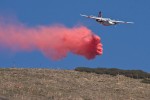 Plane dropping fire retardant